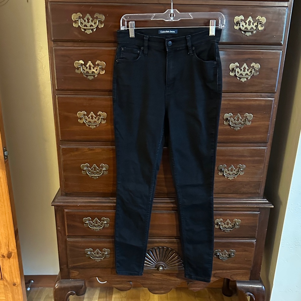 Calvin Klein black denim jeggings.